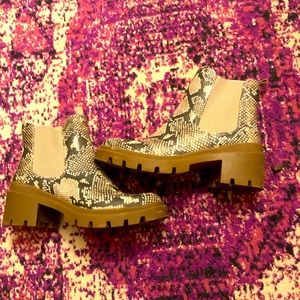Snake patterned heeled ankle boots